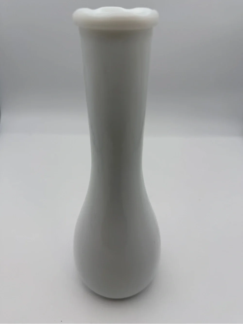 Vintage vase milk glass with embossed vines and scalloped rim